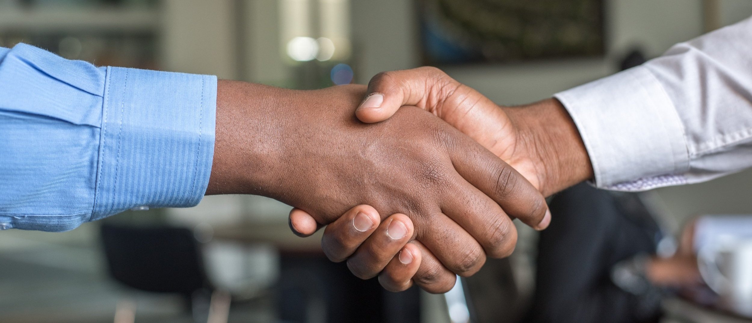 image of people handshaking